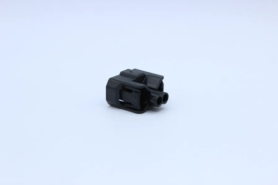 Sumitomo Female HX090 Black - 2 Terminal in Style: Flying Lead. Sumitomo HX090 in Black. These connectors are typically found in OEM applications and are available as a connector only or as a flying lead. An extra terminal is included with every connector