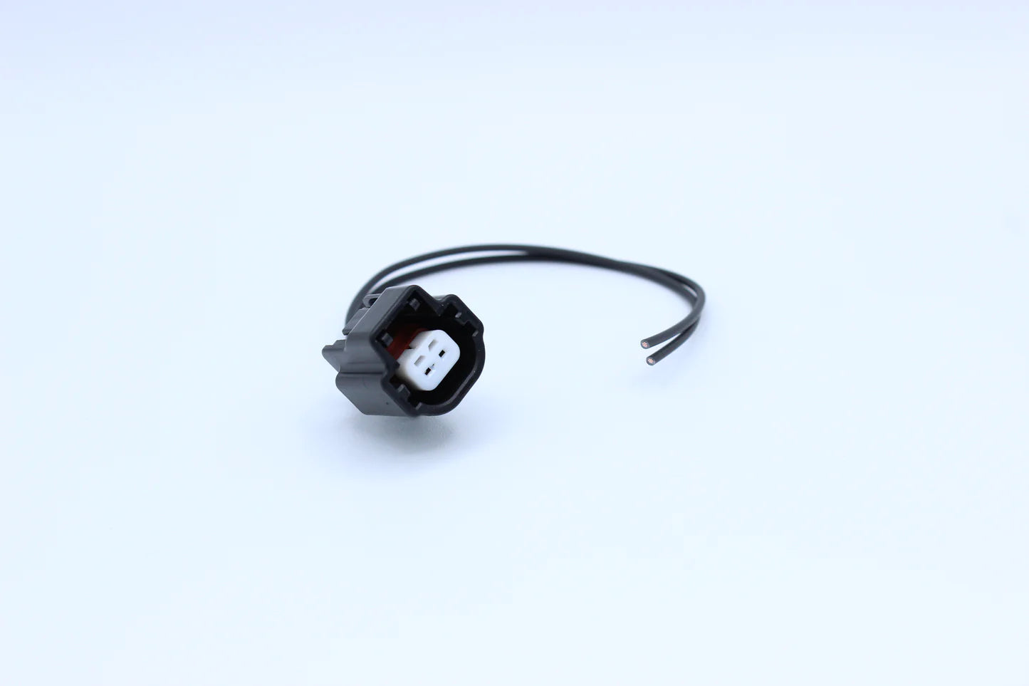 CD009 Nissan CD & JK Transmission Reverse Switch Connector in Style: Flying Lead. Our CD009 connector is black with a white keeper, 2 way plug. It's a sealed unit, keeping it safe from moisture. Fits Nissan CD009 and other CD and JK transmissions from 350