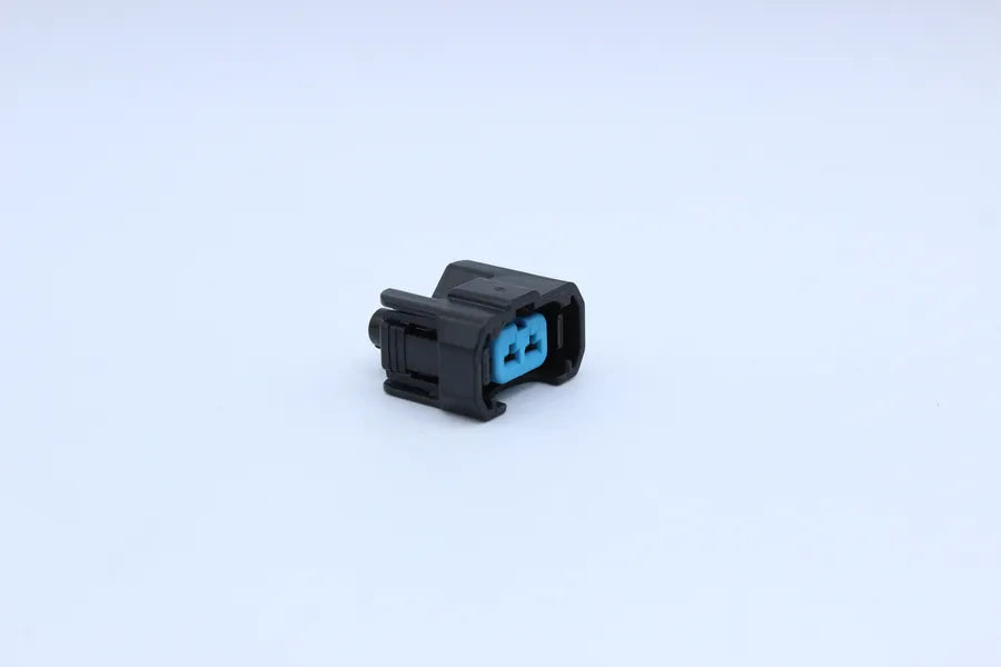 Sumitomo Female HX090 Black - 2 Terminal in Style: Flying Lead. Sumitomo HX090 in Black. These connectors are typically found in OEM applications and are available as a connector only or as a flying lead. An extra terminal is included with every connector