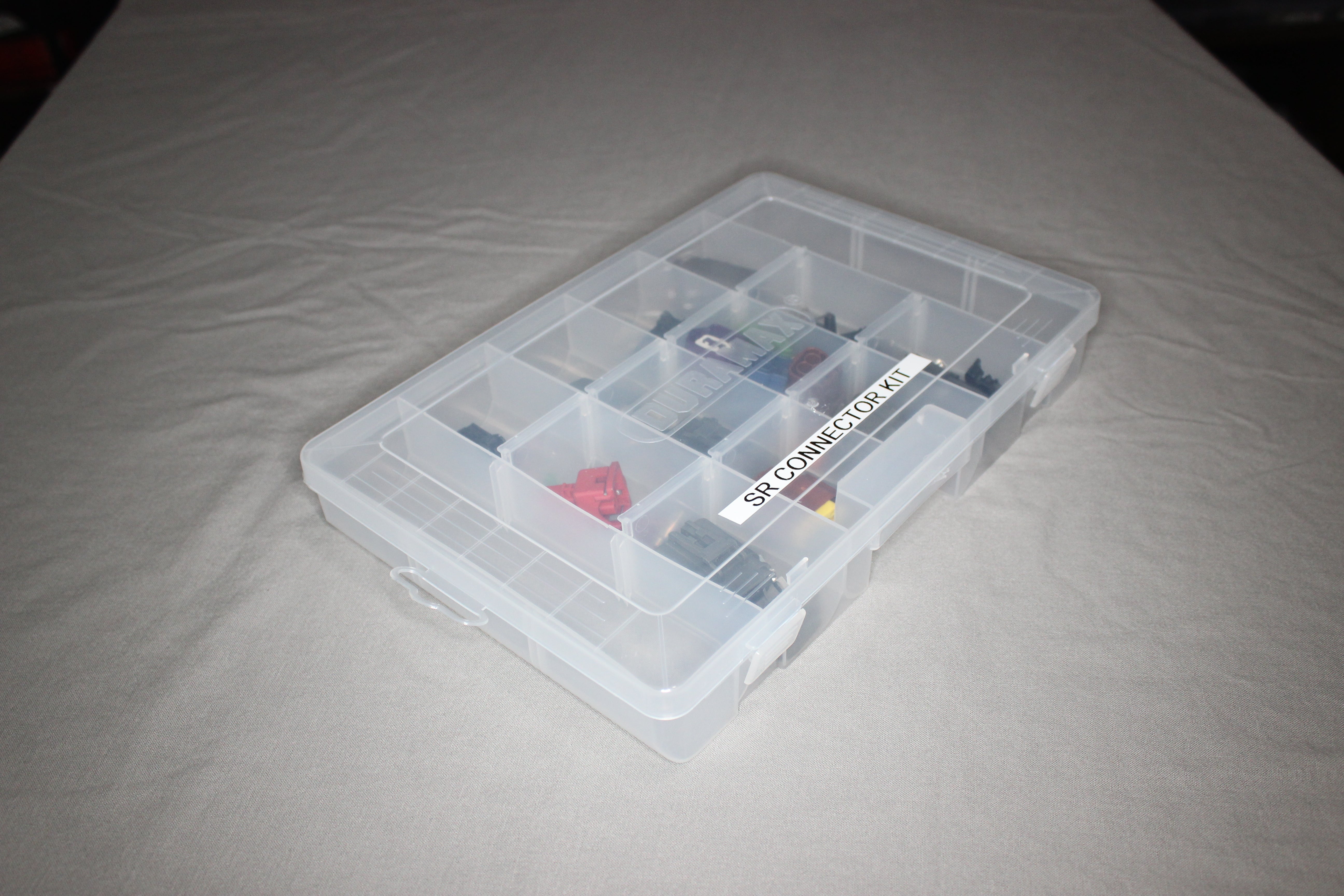 Nissan SR Connector kit in Ignition: R8. S13, 14 or 15, Red top or black top, doesn't matter this kit covers them all! Save yourself some time and hassle figuring out what to order and get an organizer bin, extra terminals and seals and a de-pin tool set.