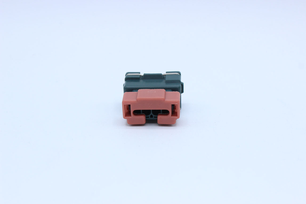 Furukawa Female JFC Green - 4 Terminal in Style: Flying Lead. Furukawa JFC in Green. These connectors are typically found in OEM applications and are available as a connector only or as a flying lead. An extra terminal is included with every connector, be