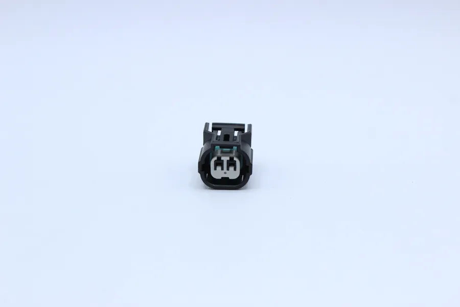 Sumitomo Female HX Black - 2 Terminal in Style: Connector Only. Sumitomo HX in Black. These connectors are typically found in OEM applications and are available as a connector only or as a flying lead. An extra terminal is included with every connector, b