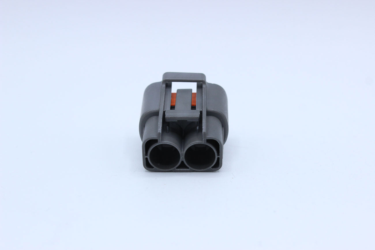 Sumitomo Female DL Gray Tab width 7.8 - 2 Terminal in Style: Connector Only. Sumitomo DL in Gray. These connectors are typically found in OEM applications and are available as a connector only or as a flying lead. An extra terminal is included with every