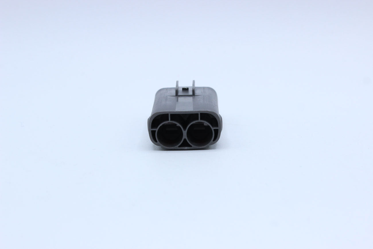 Sumitomo Male DL Gray Tab width 7.8 - 2 Terminal in Style: Connector Only. Sumitomo DL in Gray. These connectors are typically found in OEM applications and are available as a connector only or as a flying lead. An extra terminal is included with every co