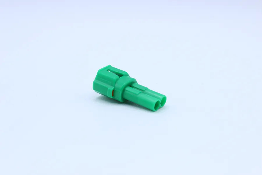 Sumitomo Male MT Green - 2 Terminal in Style: Flying Lead. Sumitomo MT in Green. These connectors are typically found in OEM applications and are available as a connector only or as a flying lead. An extra terminal is included with every connector, becaus