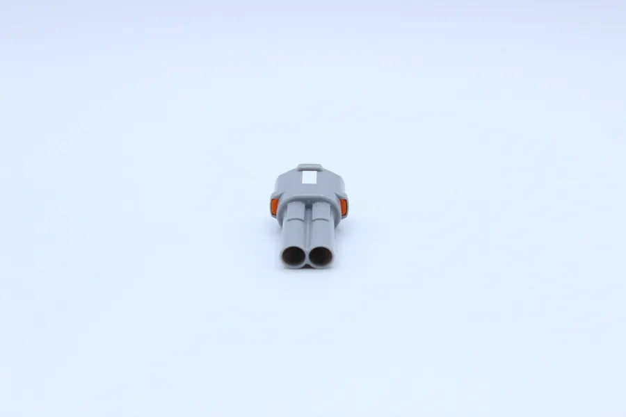 Sumitomo Male MT Gray - 2 Terminal in Style: Flying Lead. Sumitomo MT in Gray. These connectors are typically found in OEM applications and are available as a connector only or as a flying lead. An extra terminal is included with every connector, because