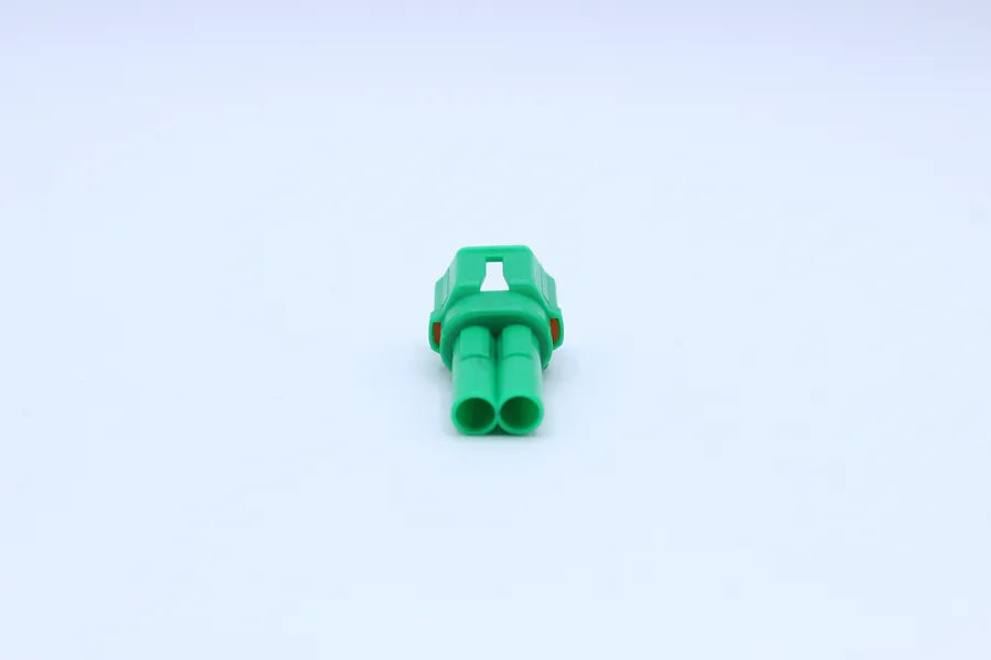 Sumitomo Male MT Green - 2 Terminal in Style: Flying Lead. Sumitomo MT in Green. These connectors are typically found in OEM applications and are available as a connector only or as a flying lead. An extra terminal is included with every connector, becaus