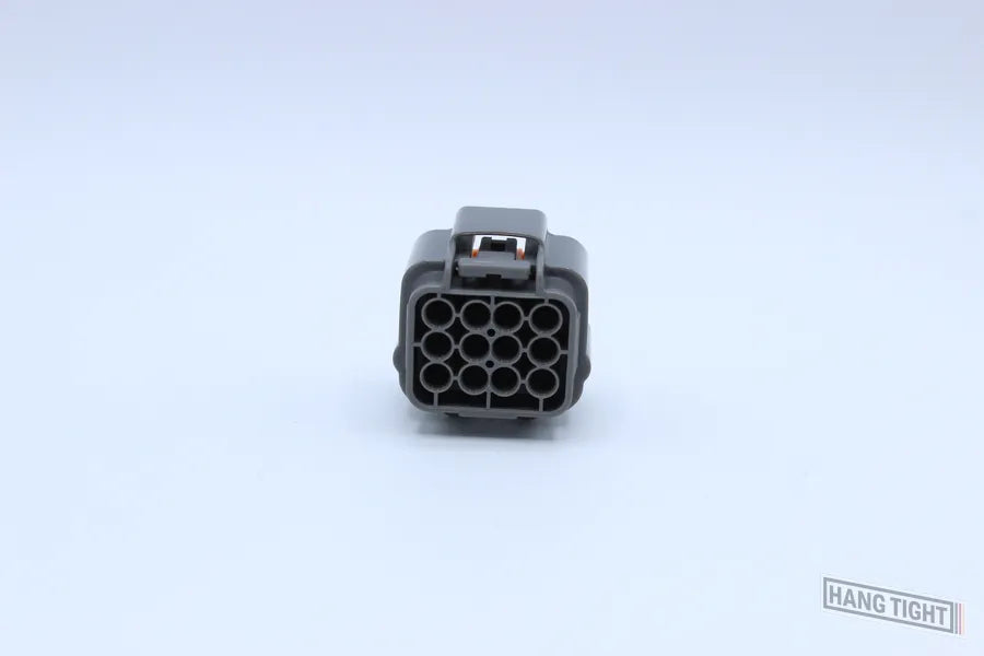 Sumitomo Female DL Gray - 12 Terminal in Style: Connector Only. Sumitomo DL in Gray. These connectors are typically found in OEM applications and are available as a connector only or as a flying lead. An extra terminal is included with every connector, be